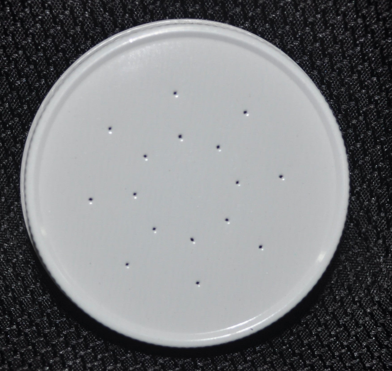 Feeder: Punched Cap