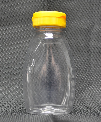 8 oz. (1/2 lb.) Classic Plastic Honey Bottles (with caps and seals)